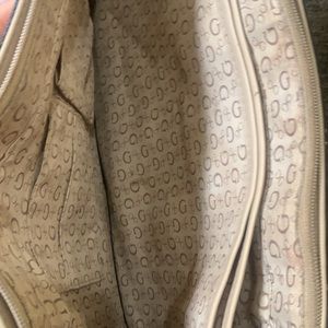 Brown and tan guess bag